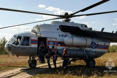 В Якутии вертолет МЧС подключили к поискам пропавших рыбаков Служба спасения РС (Я)